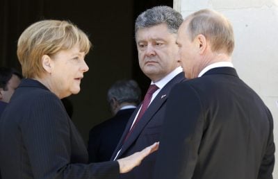 Порошенко, Меркель и Путин во время своего общения