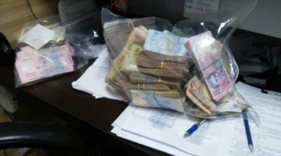 В Киеве накрыли сеть нелегальных обменников: опубликованы фото