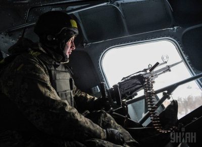 Боец АТО у пулемета Боец АТО у пулемета