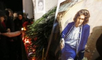 На могилу певца приходят фанаты / УНИАН На могилу певца приходят фанаты / УНИАН