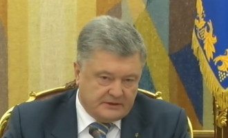 Порошенко поддержал введение военного положения в Украине Порошенко поддержал введение военного положения в Украине