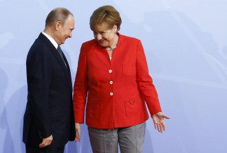 Владимир Путин и Ангела Меркель Владимир Путин и Ангела Меркель