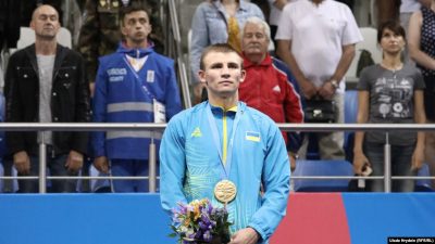 Боксер Хижняк заставил Путина стоя слушать гимн Украины на Европейских играх