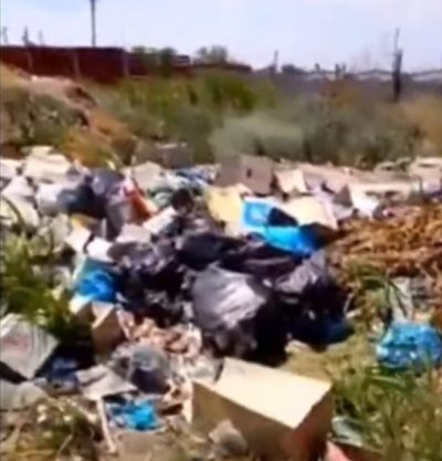 В Кирилловке возле турбаз жарятся под солнцем горы мусора