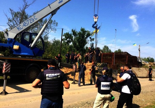 Украинская сторона начала работы по возведению моста в Станице Луганской