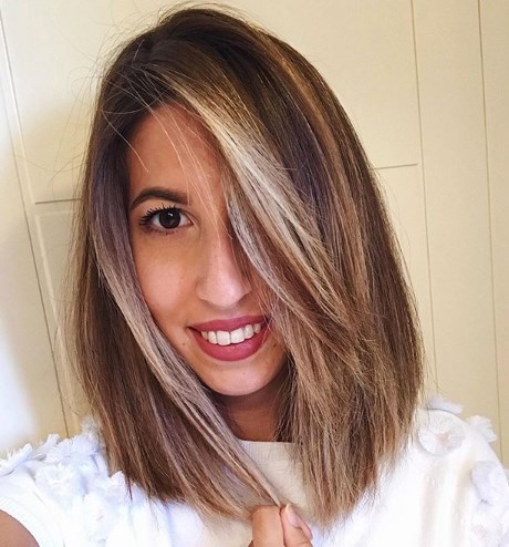 Модные женские стрижки на средние волосы