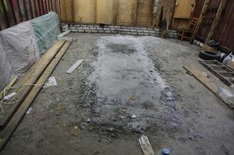 Труп закатали в асфальт