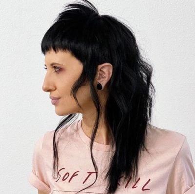 Ексцентрична жіноча стрижка маллет з 80-х знову в моді: фото