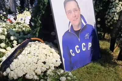 Россияне устроили вакханалию на могиле Шатунова: бросаются на крест и танцуют