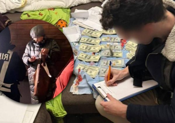 Вилучили майже 20 тис. доларів: посадовицю Центральної МСЕК спіймали на хабарі