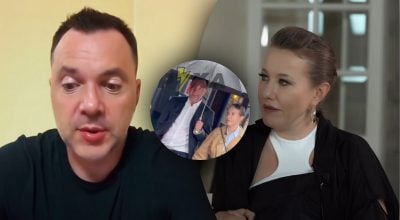 Гуляли под одним зонтом: Арестовича и россиянку Собчак 'поймали' в Лондоне